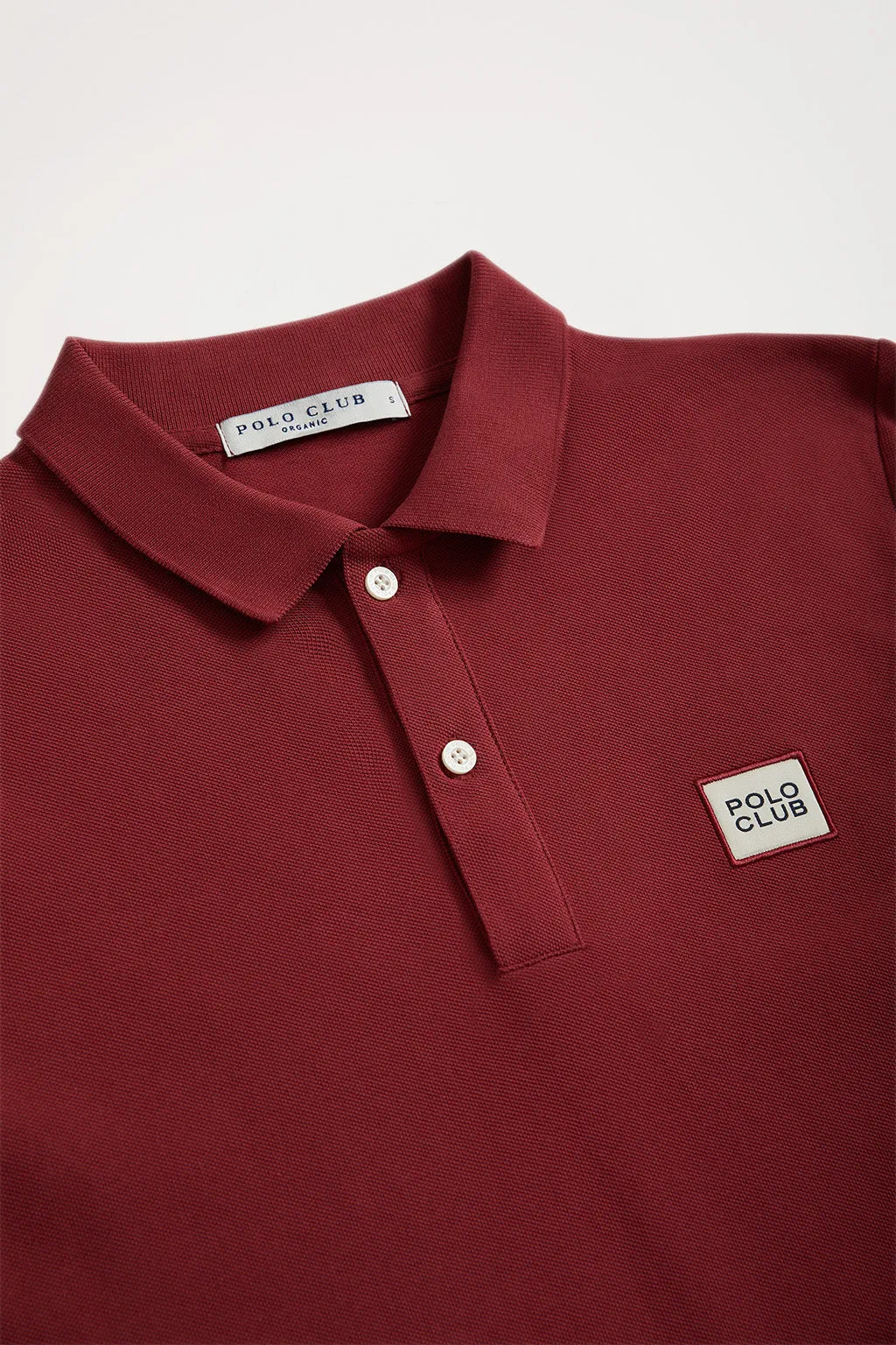 Polo orgánico de manga corta rojo oscuro Neutrals con logo